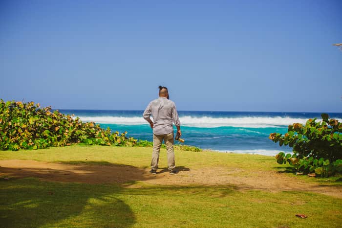 A man staring at the beach